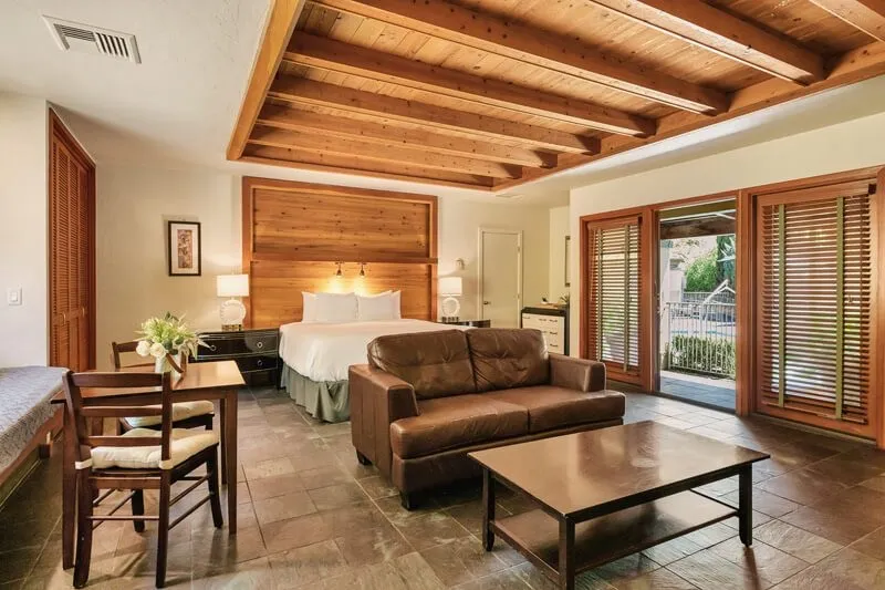 A poolside king room at Sonoma Coast Villa opening onto the garden